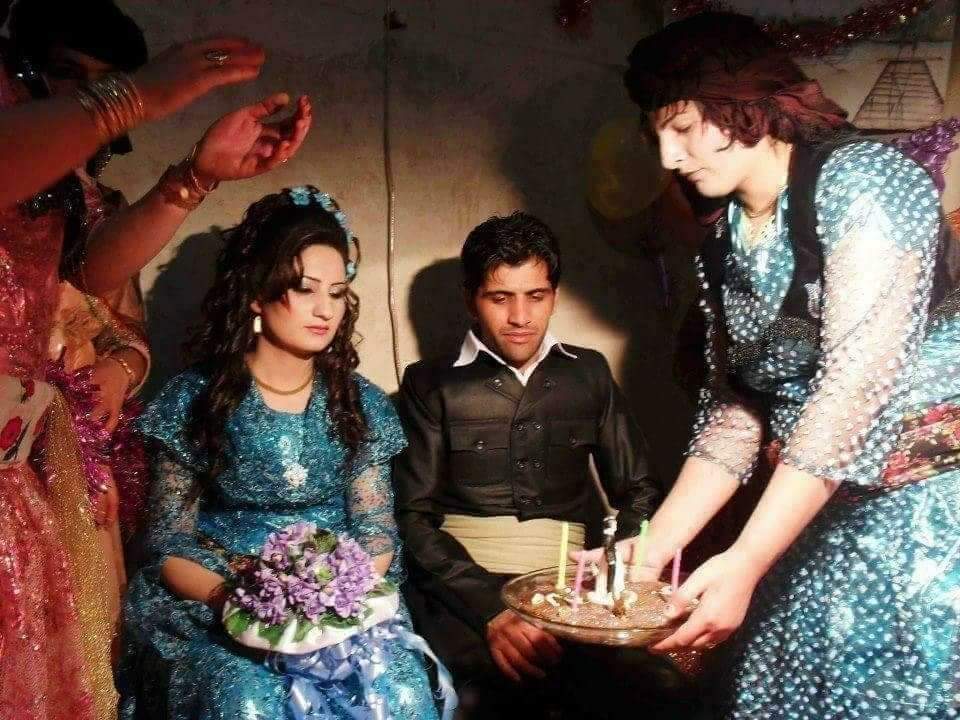 At right, Nallein Sowilo attending a friend’s wedding in Ezidikhan in 2021